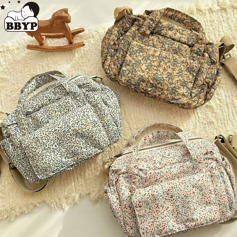 Backpack Diaper Bag - Sac à couches avec imprimé bébé